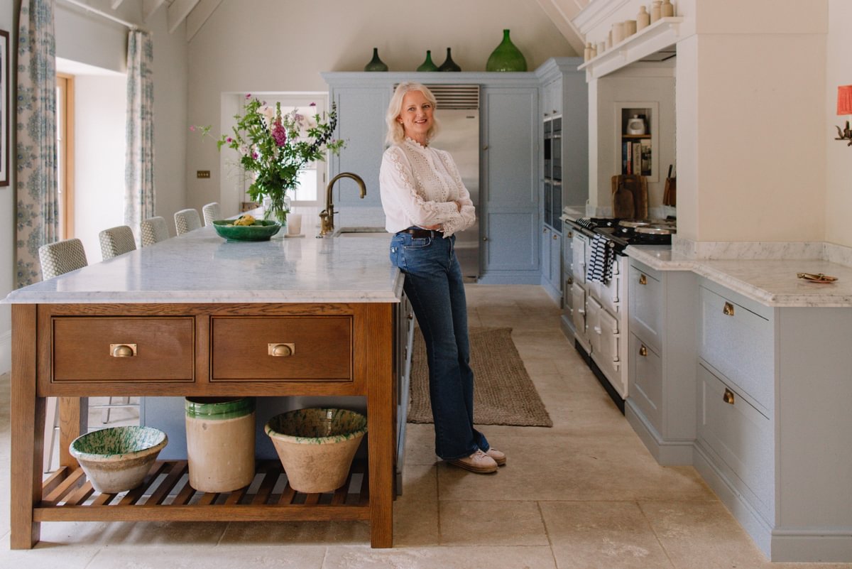 Emma Sims Hilditch Leaning Against Table For Create Academy Course