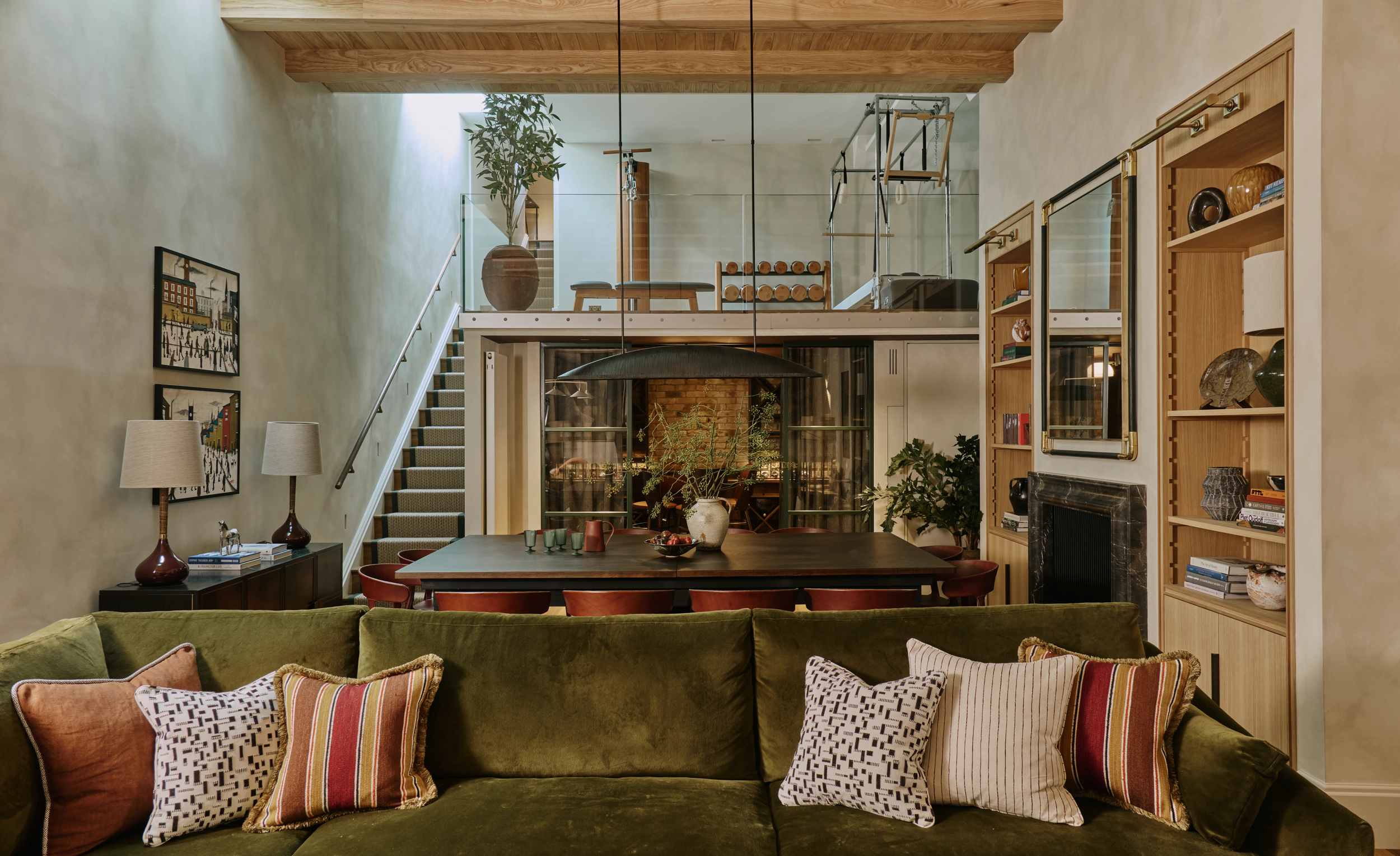multi-tiered-basement-with-gym-and-green-sofa-in-south-kensington-family-home-project