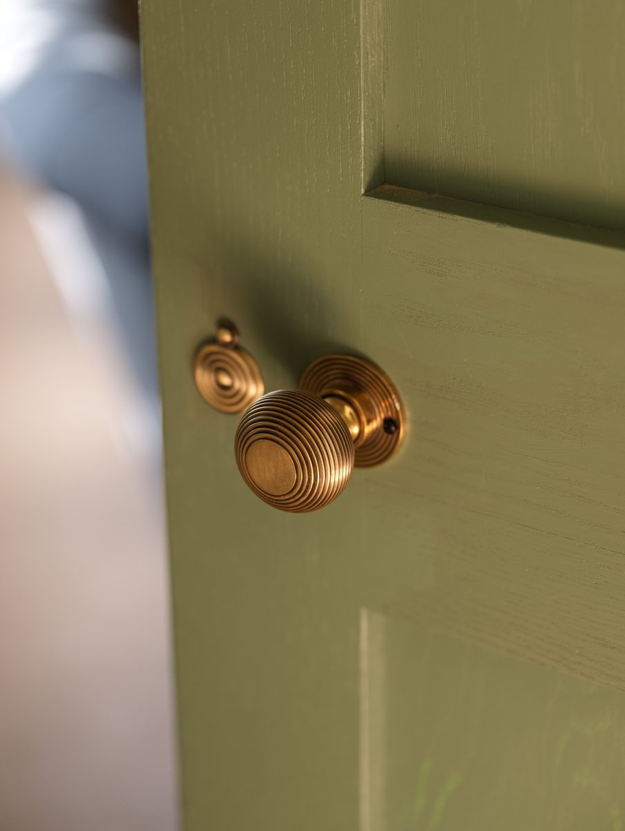 Sims Hilditch Interior Design Jamie's Farm House Brass Door Knob On Green Door