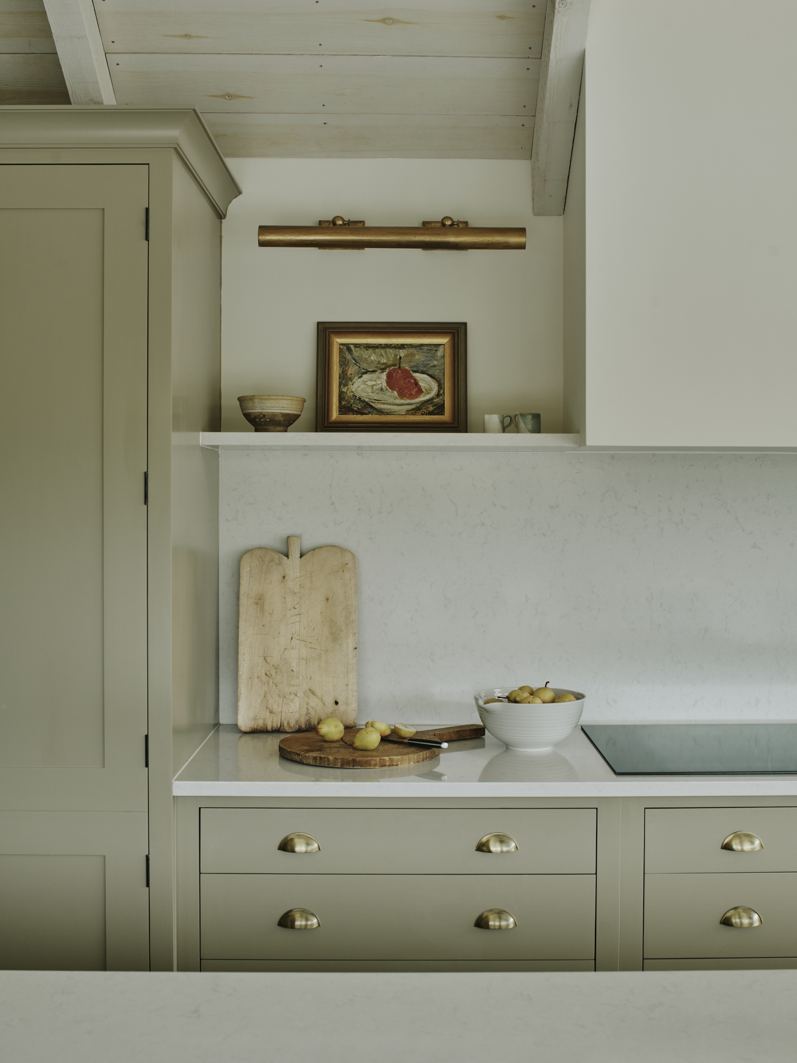 Muted green kitchen designed by Sims Hilditch