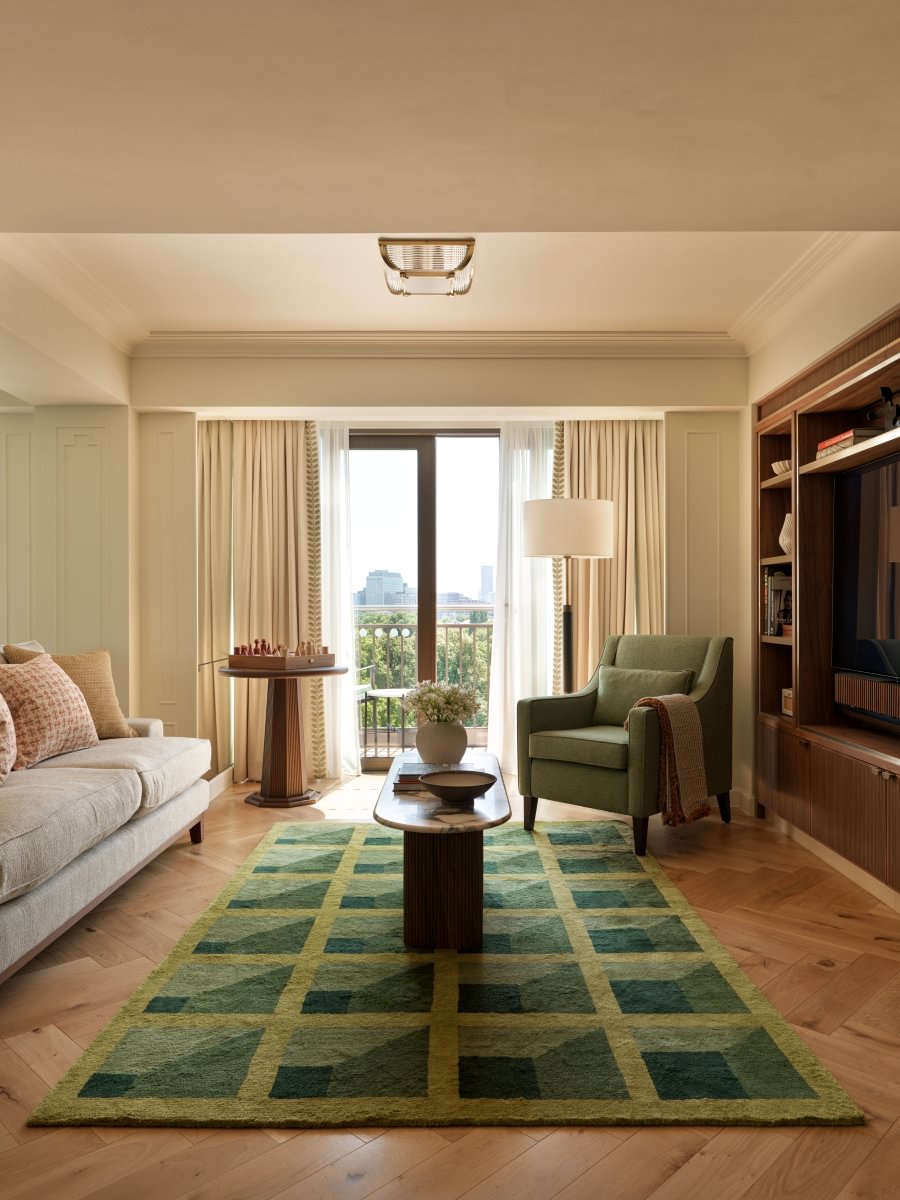 Sims Hilditch Interior Design Mayfair Hotel Apartment Living Area TV Green Carpet City Views