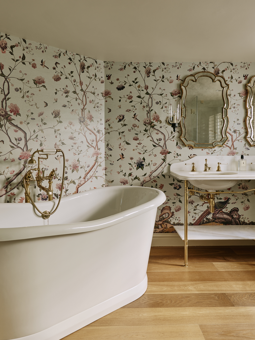 Bathroom With Rolltop Bath And Patterned Wallpaper In Chelsea Townhouse