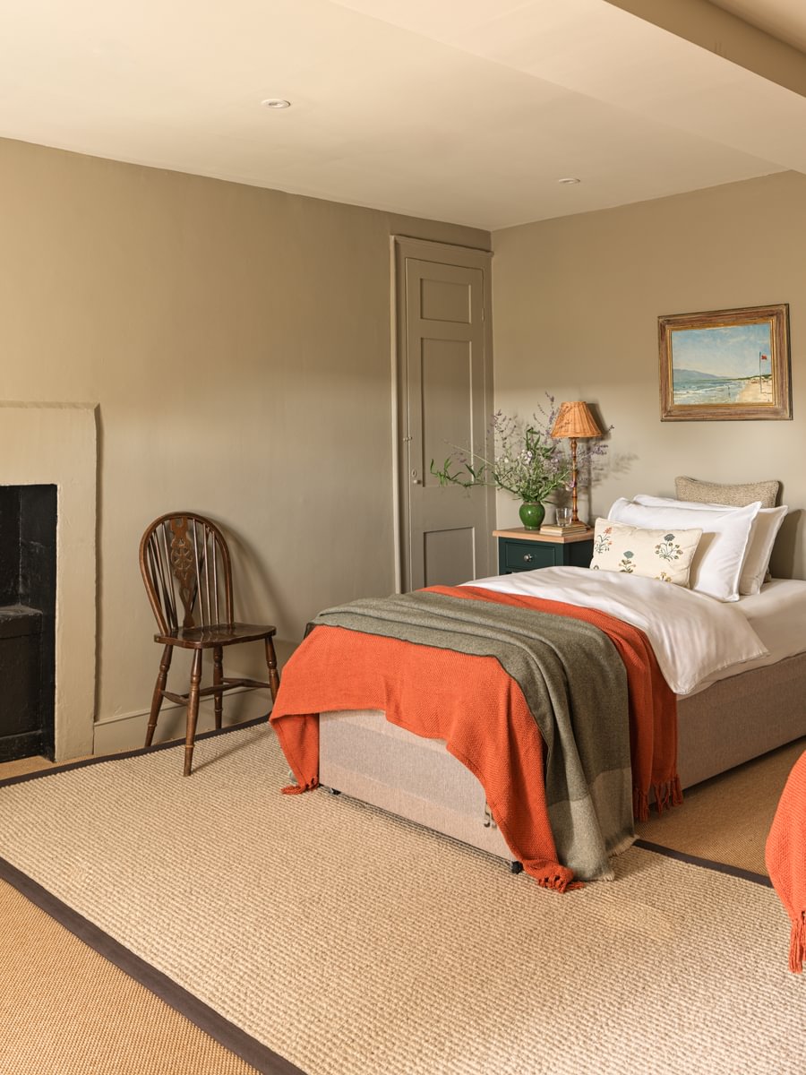 Sims Hilditch Interior Design Jamie's Barn House Twin Room With Orange Blankets