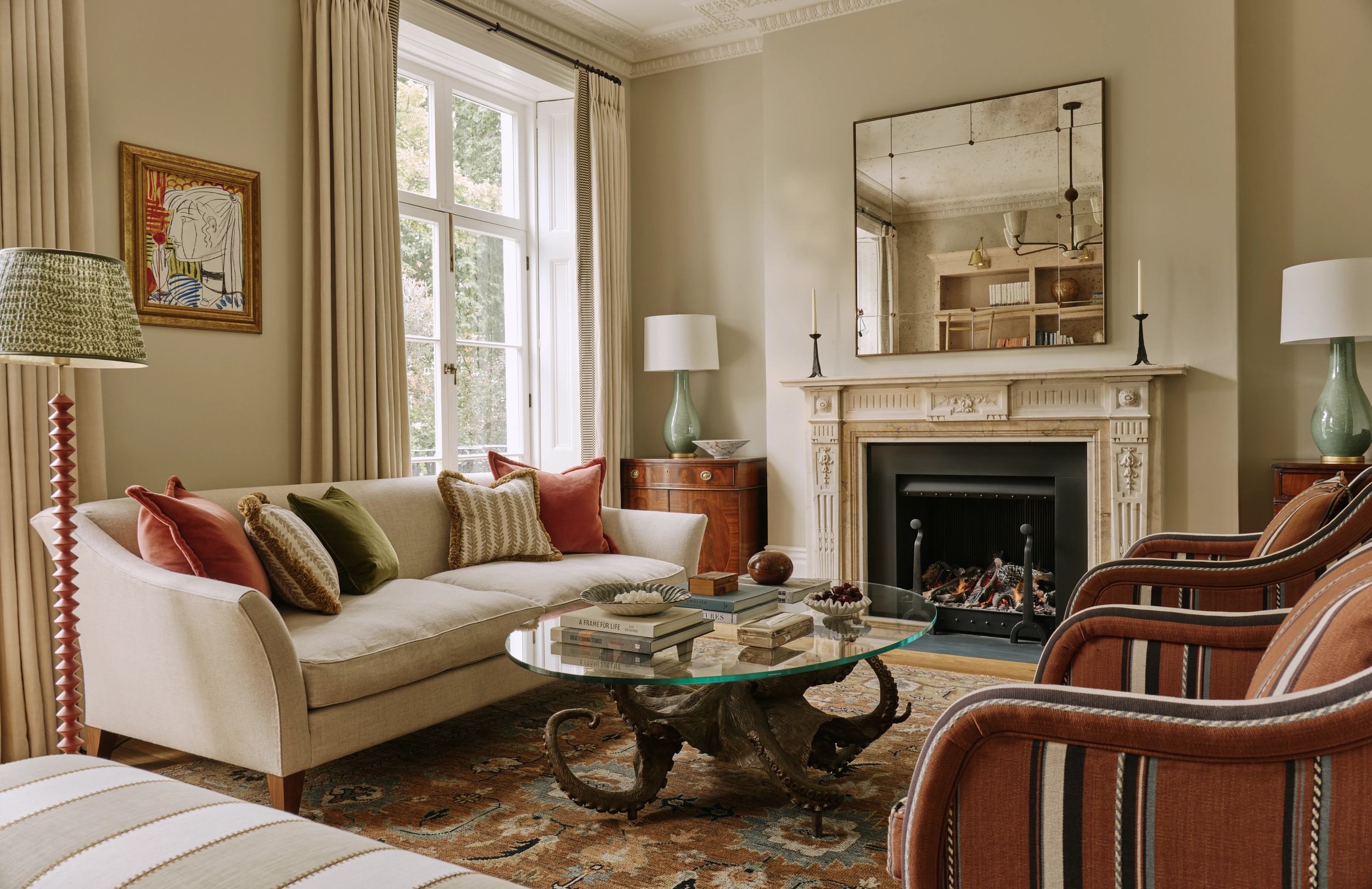 drawing-room-with-striped-chairs-and-octopus-coffee-table-in-south-kensington-family-home-project