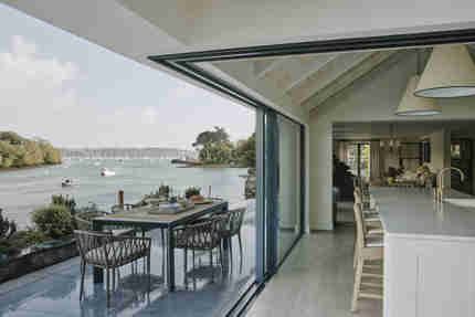 Outdoor dining with views of Mylor Creek