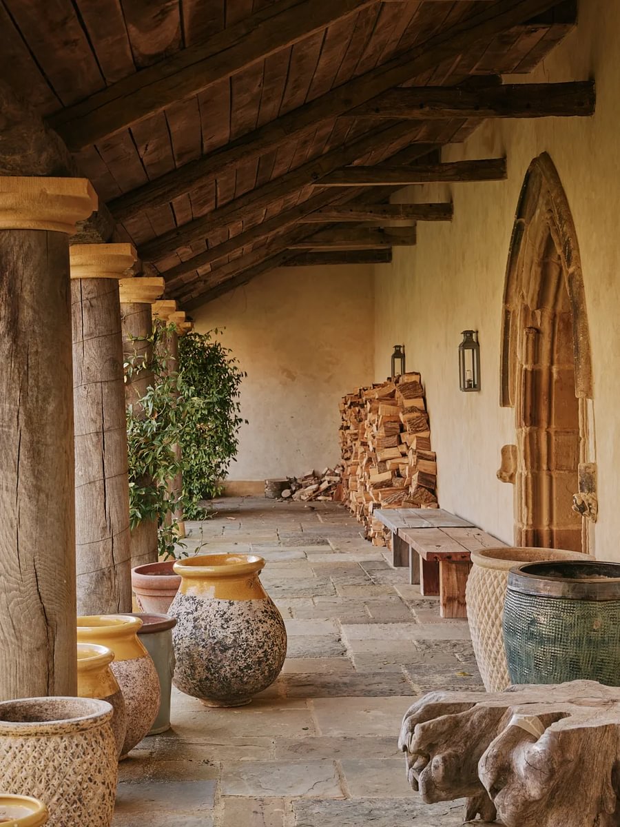 Sims Hilditch Interior Design Outside of House Log Pile