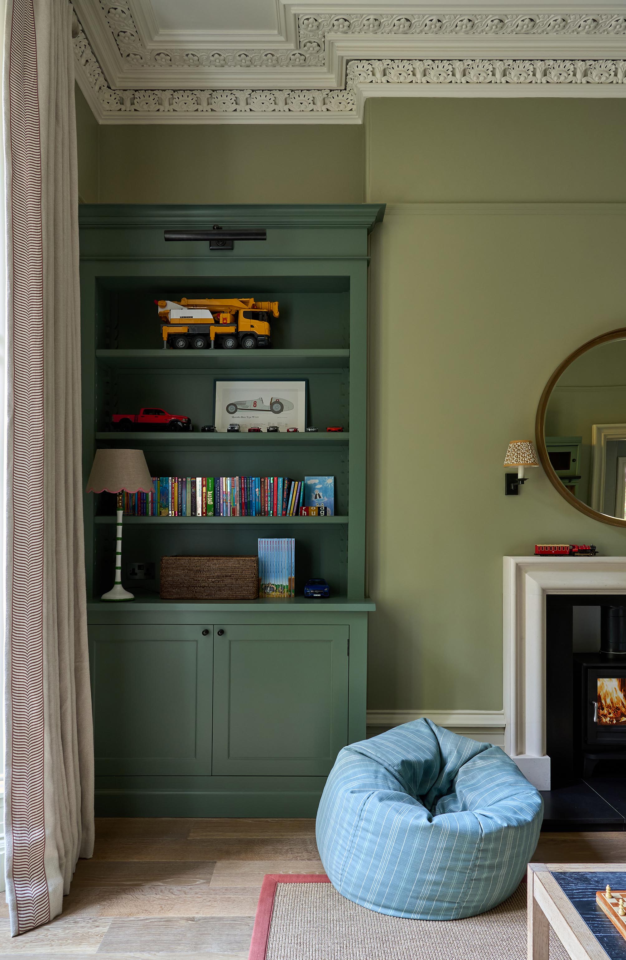 sims-hilditch-interior-design-aberdeen-family-home-play-room-bookcase-portrait